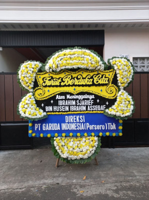 Papan Bunga Duka di Mane