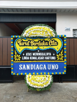 Papan Bunga Duka di Mane